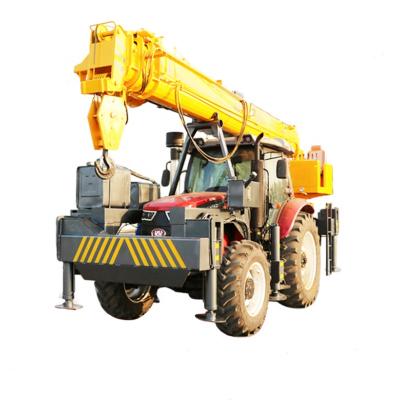 China Tractor four-wheel drive drilling rig TRUCK CRANE Electric pole lifting and digging crane for sale