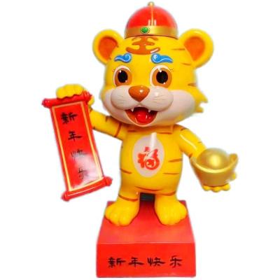 China New Year's mascot China A boutique fiberglass cartoon tiger statue is on display in Times Square for sale