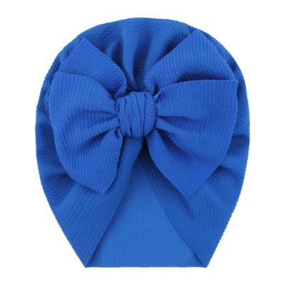 China Winter Knotted Cheap Striped Newborn Soft Hair Baby Turban Hat Beanie Hat Accessory Headdress for sale