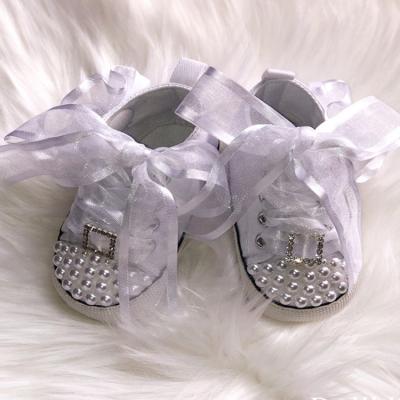 China Bling Flat Pearl Bow Baby Sport Shoes Toddler Girl Canvas Soft Unique High Top Sneakers for sale