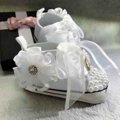 China Fancy Yarn Round Bowknot New Arrival Sneakers Canvas Shoes White Walking Shoes For Baby Toddler Girls for sale