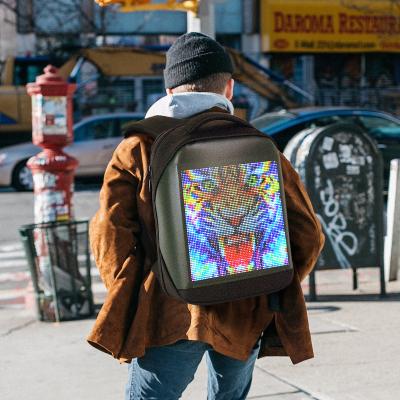 China Led Screen Shell Smart App Control Screen Display Walk Billboard Anti-theft Waterproof Smart Soft Advertising Led Backpack for sale