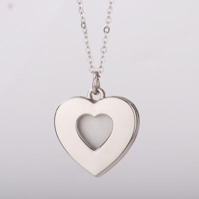 China Romantic Sublimation Cutout Silver Heart Necklace With Image For Couples for sale