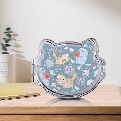 China Personalized Custom Folding Hand Held Mirror For Travel With Sublimation Picture for sale