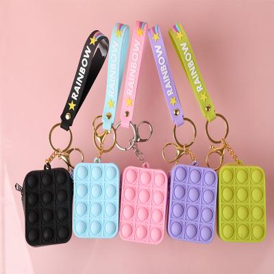 China Children's Educational Toys Funny Anti Push Stress Reliever Toys Busy Person Stationery Bag Sensory Toy Popping Bubble Coin Purse for sale