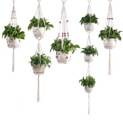 China New Indoor Factory Price Fashion Cotton Rope Boho Plant Hanger Eco-Friendly Macrame Plant Hangers With Hook Beads for sale