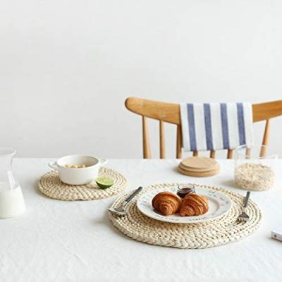 China Sustainable Eco Friendly Natural Round Place Mat Braided Straw Placemats Customized Table Mat for sale