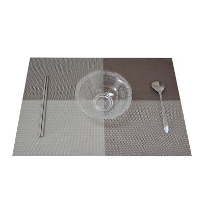 China Sustainable Factory Anti Skid Heat Insulation PVC Place Mat Coffee Table Woven Washable Dining Place Mats for sale