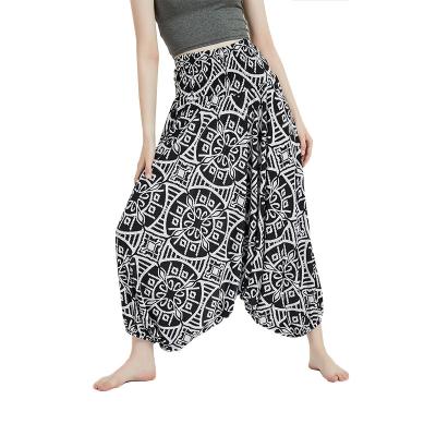 China Anti-wrinkle high quality women's streetwear printing plus size loose pants women's wide leg crotch pants large pants for sale