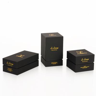 China Custom Handmade Logo Luxury Black Paper Packaging Box Perfume Packaging Box for sale