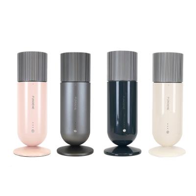 China Creative style Customized wholesale small wall-mounted and desktop aroma diffuser with remote control app for sale