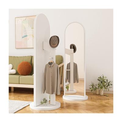 China Durable Modern Multifunctional Rotatable Wood Frame Bedroom Floor Standing Dressing Mirror Miroir With Coat Rack Hat Rack Storage for sale