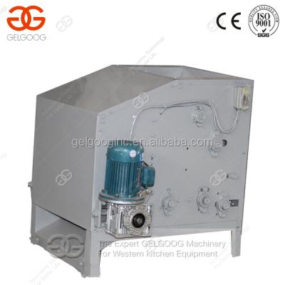 China Automatic cashew shelling shelling machine/cashew nut sheller/cashew nut sheller for sale