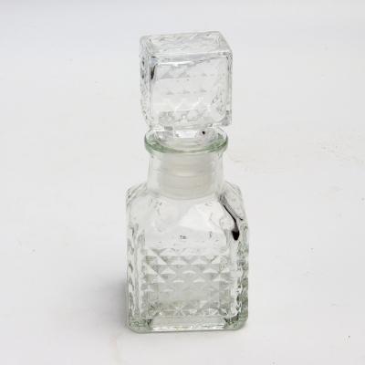 China 2oz 60ml Mini Storage Cosmetic Wholesale Glass Jar With Lid Glass Use For Whiskey Liquor Alcohol PERFUME for sale