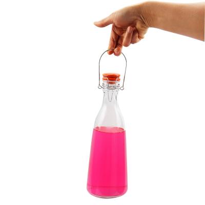 China Custom Beverage 1000ml 32oz 1l Oil Juice Water Liquor Eco Eco Recycling Big Glass Bottle For Milk With Handle for sale