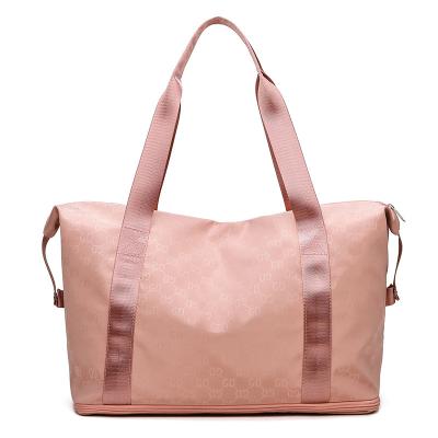 China 2022 Customized Wholesale Fashion Foldable Sports Handbag Waterproof Gym Tote Bag Honeymoon Weekender Overnight Bag For Women for sale