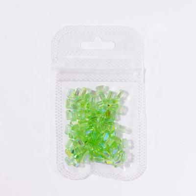 China Flatback Nail Art Jewelry Green Diamond Ice Cube Colored Resin Shaped Diamond Decoration Transparent Resin Octagonal Drill for sale