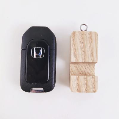 China Car PORTABLE Wooden Key Accessories Cell Phone Fashion Mobile Phone Holder Hanging Bracket for sale