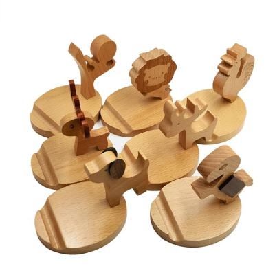 China Wholesale PORTABLE Creative Wooden Stand Cute Cartoon Mobile Phone Stand for sale