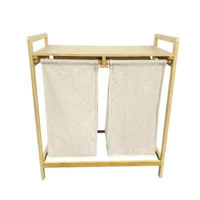 China Modern Bamboo Laundry Basket 2 Sections Laundry Hamper With Removable Sliding Wooden Bamboo Organizer Bags Shelf Laundry Cabinet for sale