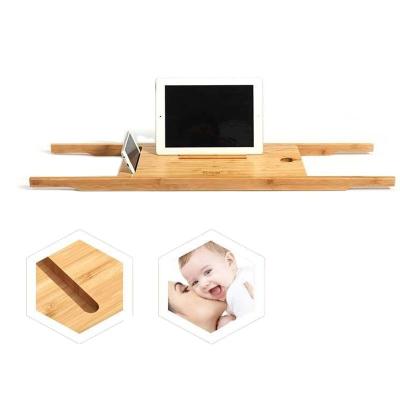 China Sustainable Unique Bamboo Bathtub Tray Wooden Bath Caddy With Expanding Arm for sale