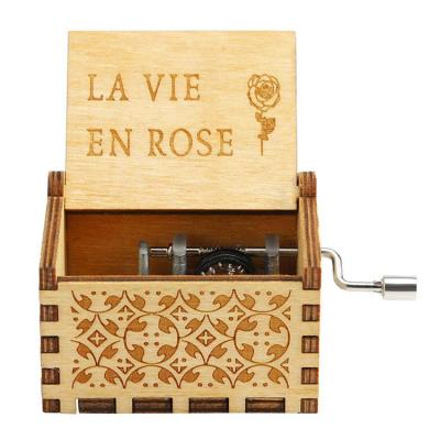 China Laser Cutting Wholesale Unique Beautiful Wooden Music Box La Struggle In Rose For Birthday Gift for sale