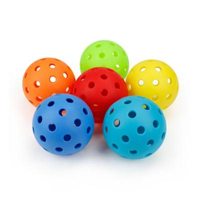 China Customized 40 Holes 74mm Diameter Outdoor PE Pickleball With Different Colors for sale