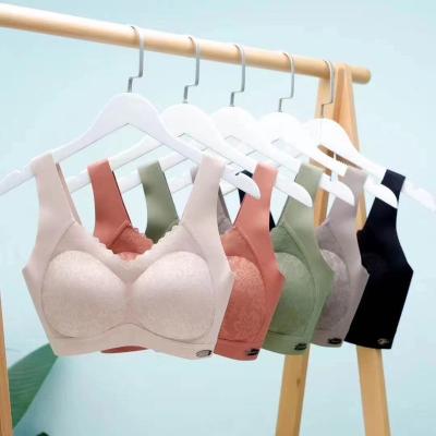 China QUICK DRY Women Comfortable Seamless Latex Bra Padded Ladies Lace Up Sleep Tank Tops Traceless Thailand Bralette for sale