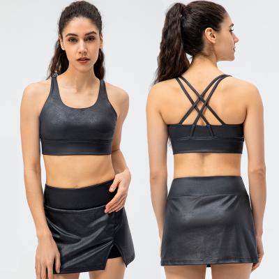 China Women's Sexy Tennis Cross Back Skirt Faux Leather Breathable Cloth Wholesale Sportswear Two Pieces Yoga Fitness Suit Set for sale