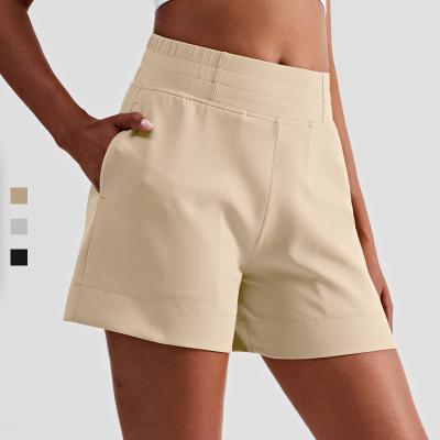 China 2022 New High Trend Loose Waist Fitness Breathable Casual Shorts With Pocket Side Workout Wear Gym Yoga Running Shorts for sale