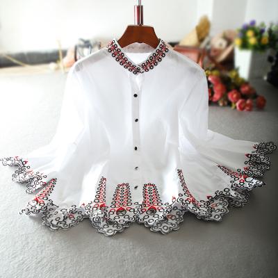 China Custom women's anti-pilling loose throws short shirt ethnic style hollow embroidery button down horn sleeve blouse doll top for sale