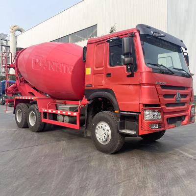 China Red Machinery Repair Shops Sinotruk HOWO Concrete Mixer Truck With 12CBM Pump Truck Concrete Mixer Price for sale