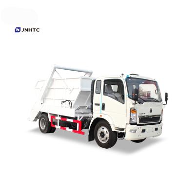 China Hotels 6cbm New Swing HOWO 4X2 Arm Garbage Truck for sale