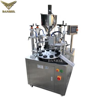 China Factory Price Automatic Beverage Cosmetic Industry Soft PVC Tube Filler And Sealer With Mxing And Heating Hopper for sale