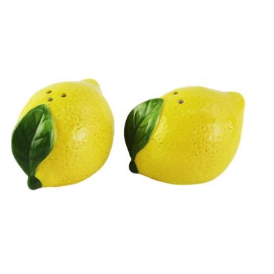 China Sustainable Ceramic Fruit Lemon Shaped Seasioning Salt Pepper Shaker Pot for sale