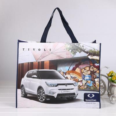 China Custom Logo Eco-friendly Handled Car Design PP Handle Promotional Large Nonwoven Laminated Shopping Bag for sale