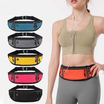 China Professional Water Proof Logo Adjustable Mini Reflective Sport Custom Waist Bag With Earphone Jack for sale