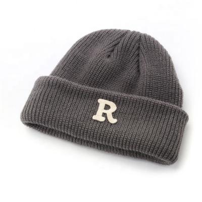 China 2021 Letter Fashion Letter Warm Outdoor Women's Thick Warm Winter Skullies Knitted Skullies Hats for sale