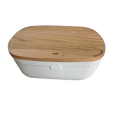 China Sustainable Ceramic Bread Bin Bread Bin Home Storage Jar Around Shape Ceramic Oval Bread Bin With Wooden Lid for sale