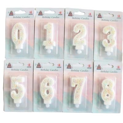 China New popular designed cake candy number candle 0-9 with glitter and pearl decoration for birthday party for sale