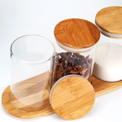 China Heatable Hot Selling High Borosilicate Food Bottle Storage Container Glass Airtight Jars With Bamboo Lid for sale