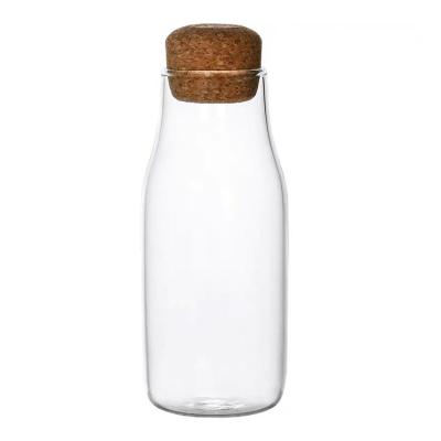 China Factory direct supply heatable cheap price 150ml 300ml 700ml storage glass jars with bamboo lid for sale