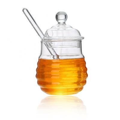 China Kitchen Supplies Borosilicate Spoon 280ml Small Bee Heatable Glass Jar Honey for sale