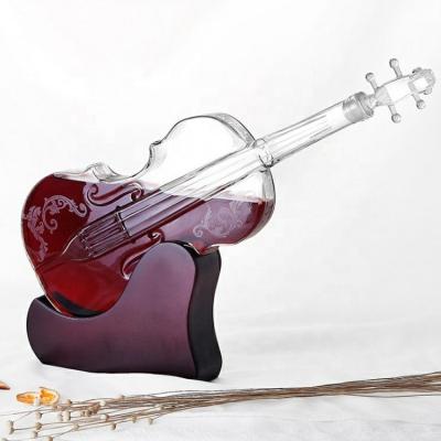 China 2022 Cold Heat Resistant Custom Design 1000ml Handmade Custom Violin Shape Transparent Glass Wine Bottle Decanter for sale