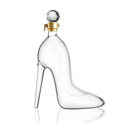 China Hot Sale 750ml Recyclable Hot High Heel Vodka Eco-friendly Brandy Frosted Wine Glass Bottles for sale