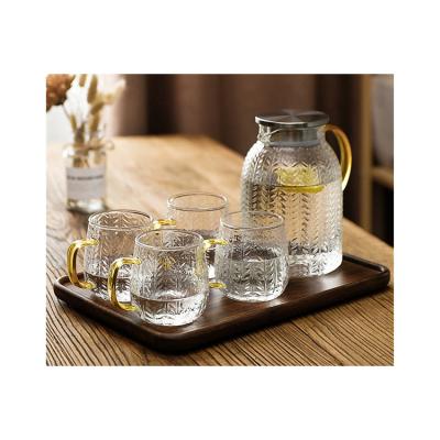 China Viable Wholesale Heat Resistant Glass Pitcher Wooden Low Glass Water Jug With Plastic Lid for sale