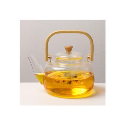 China Sustainable Set Teapot Hot Sale Heat Resistant Loop-handled Glass Teapot With Wooden Handle for sale