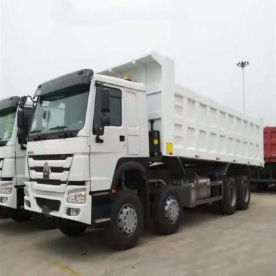 China Left Hand Driving SINOTRUCK NEW OR USED HOWO 8X4 Tipper Truck Dual Circuit Air Brake Very Cheap Cars for sale