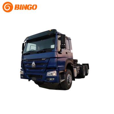 China LOW PRICE SINOTRUK HOWO 6X4 336HP RHD TRACTOR TRUCK TRACTOR MAIN ENGINE ZZ4257S3241W IN STOCK 6800x2496x3158MM for sale