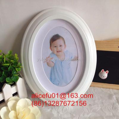 China Home and Office Decor Wall Decoration European Style Baby Picture Picture Frames White Wooden Oval Picture Frame for sale